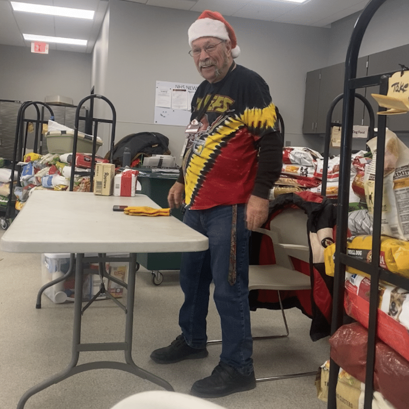 Ernie in his Kansas City Chief gear at Pet Food Pantry