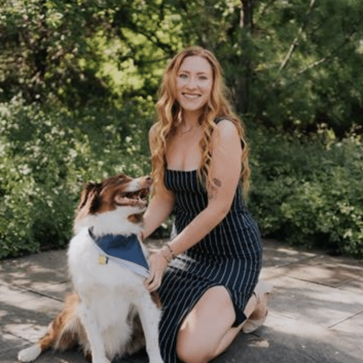 Finnegan the dog with his owner outside